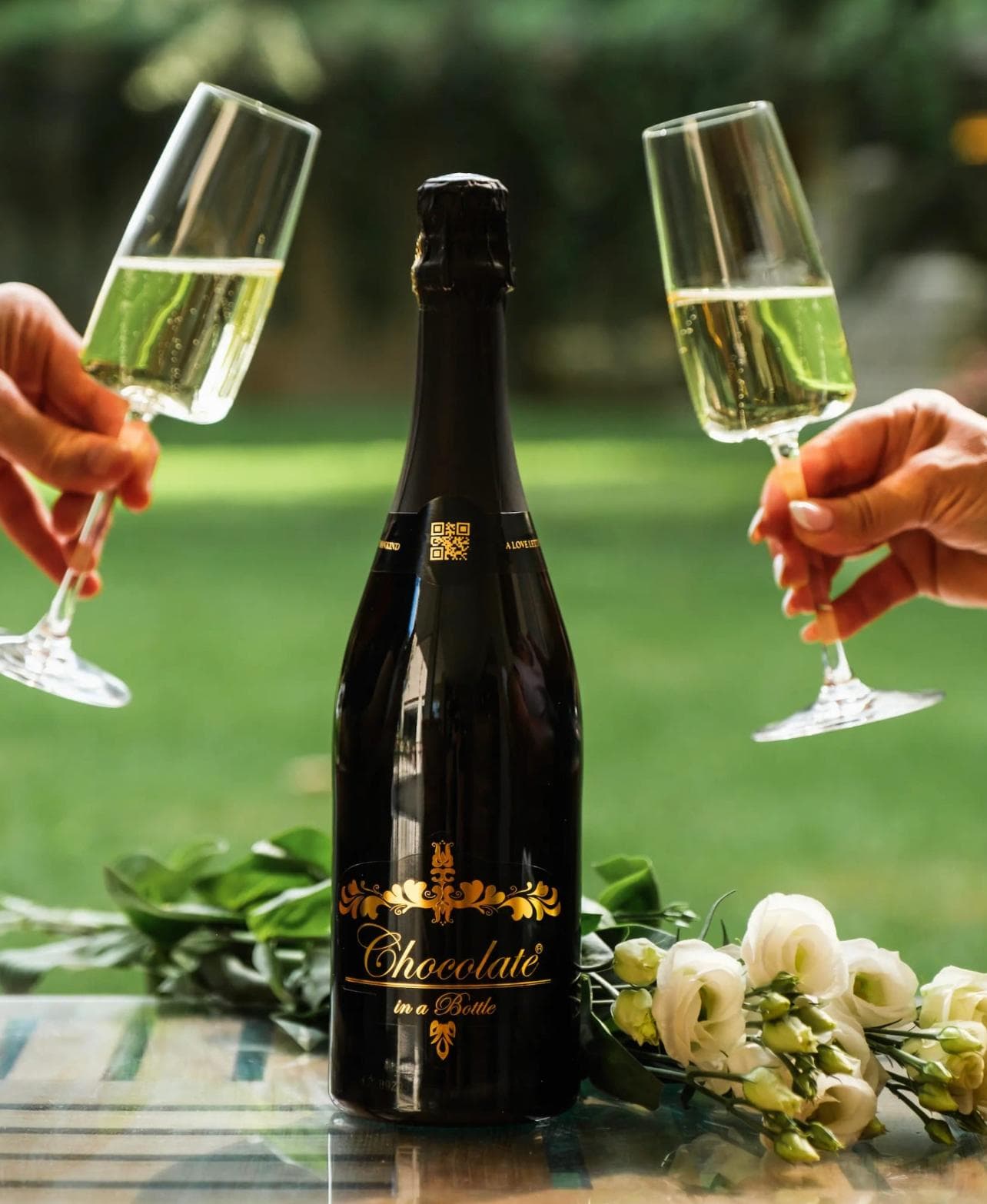 Chocolate in a Bottle champagne bottle with two glasses